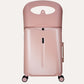Pink MiaMily carry-on suitcase with wheels and an upright seat-back section.