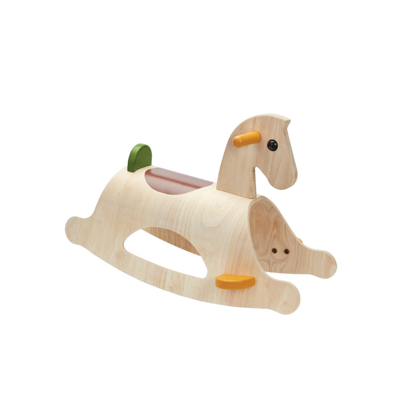 Natural wood PlanToys rocking horse with a pale seat and curved rocker base.