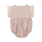 Rear view of the pale rose Donsje Vailen playsuit with ruffled sleeves.