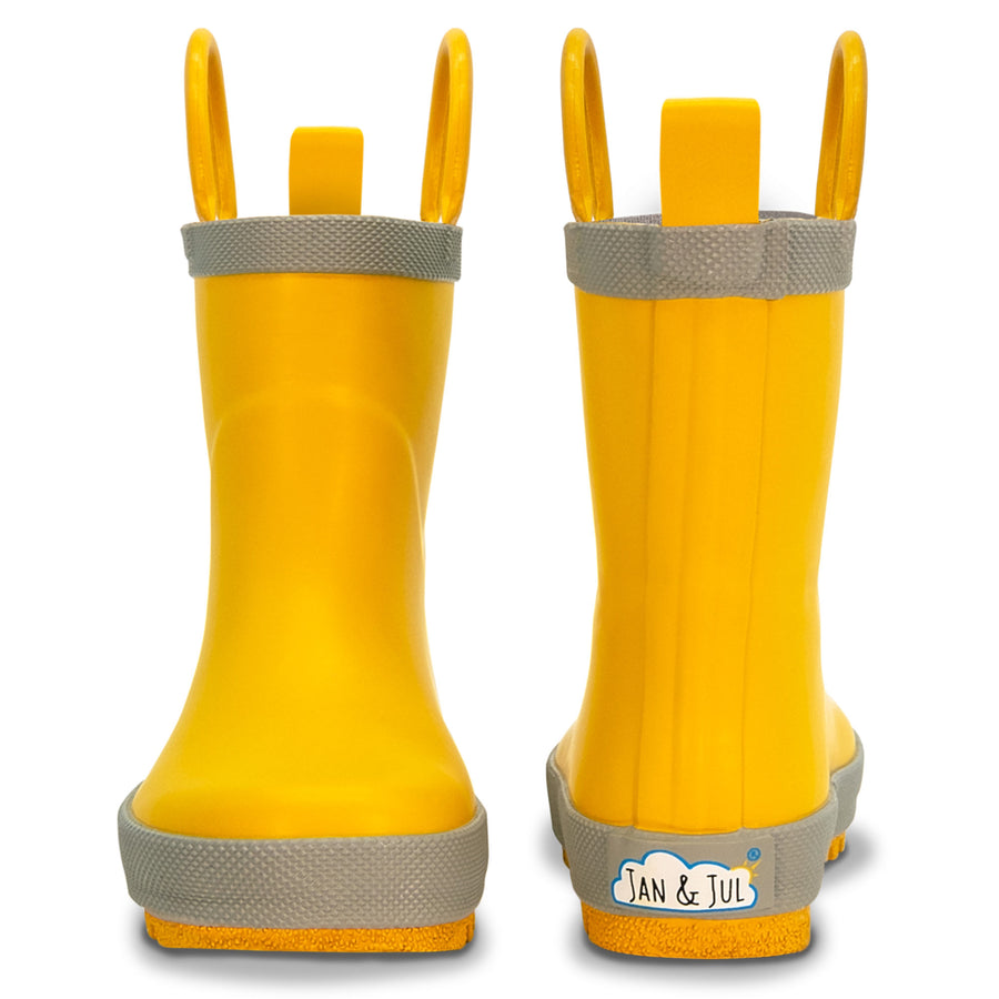 Yellow Jan & Jul rain boots with gray trim and yellow pull handles.