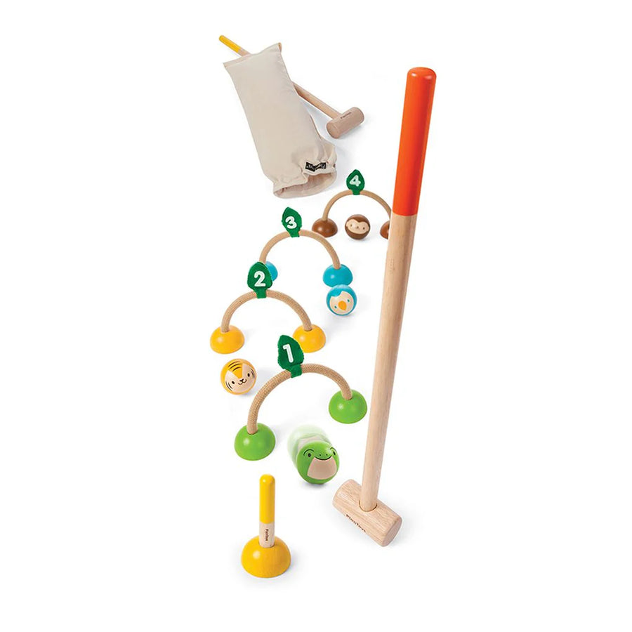 PlanToys croquet set with numbered hoops, mallets, balls and a drawstring bag.