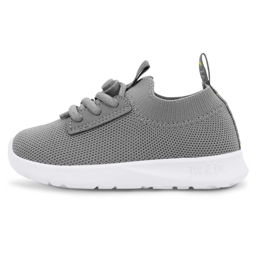 Gray Jan & Jul knit-look shoe with gray laces and a white sole, side view.