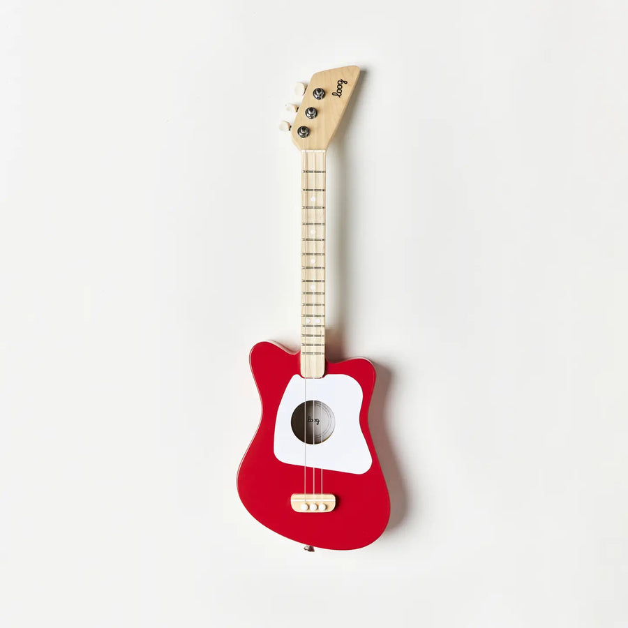 Red Loog Mini acoustic guitar with a pale wood neck and white pickguard, front view.