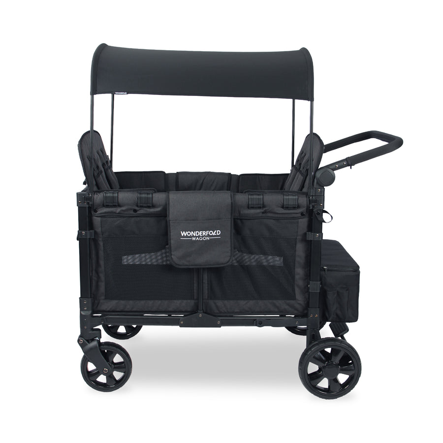 Black WonderFold wagon with raised seats, a canopy and side storage pockets, side view.