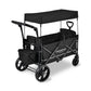 Black WonderFold X2M stroller wagon with a canopy and push handle, angled view.