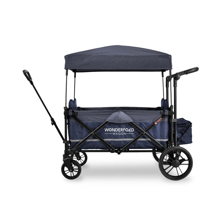 Blue WonderFold X4M stroller wagon with a canopy and push handle, side view.