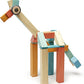 Tegu Sunset blocks arranged into a long-necked animal with a wheel for an eye.