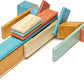 Tegu Sunset blocks arranged into a long, layered model with blocks extending to each side.
