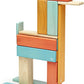 Tegu Sunset blocks arranged into a tall figure with a pointed head and wide feet.