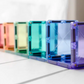 A row of open cubes built from pastel CONNETIX square tiles.