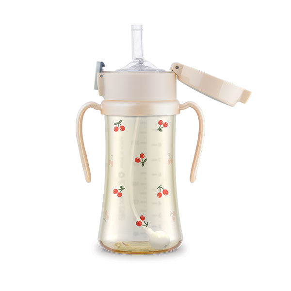 Grosmimi straw cup with beige handles and lid and red cherry illustrations.
